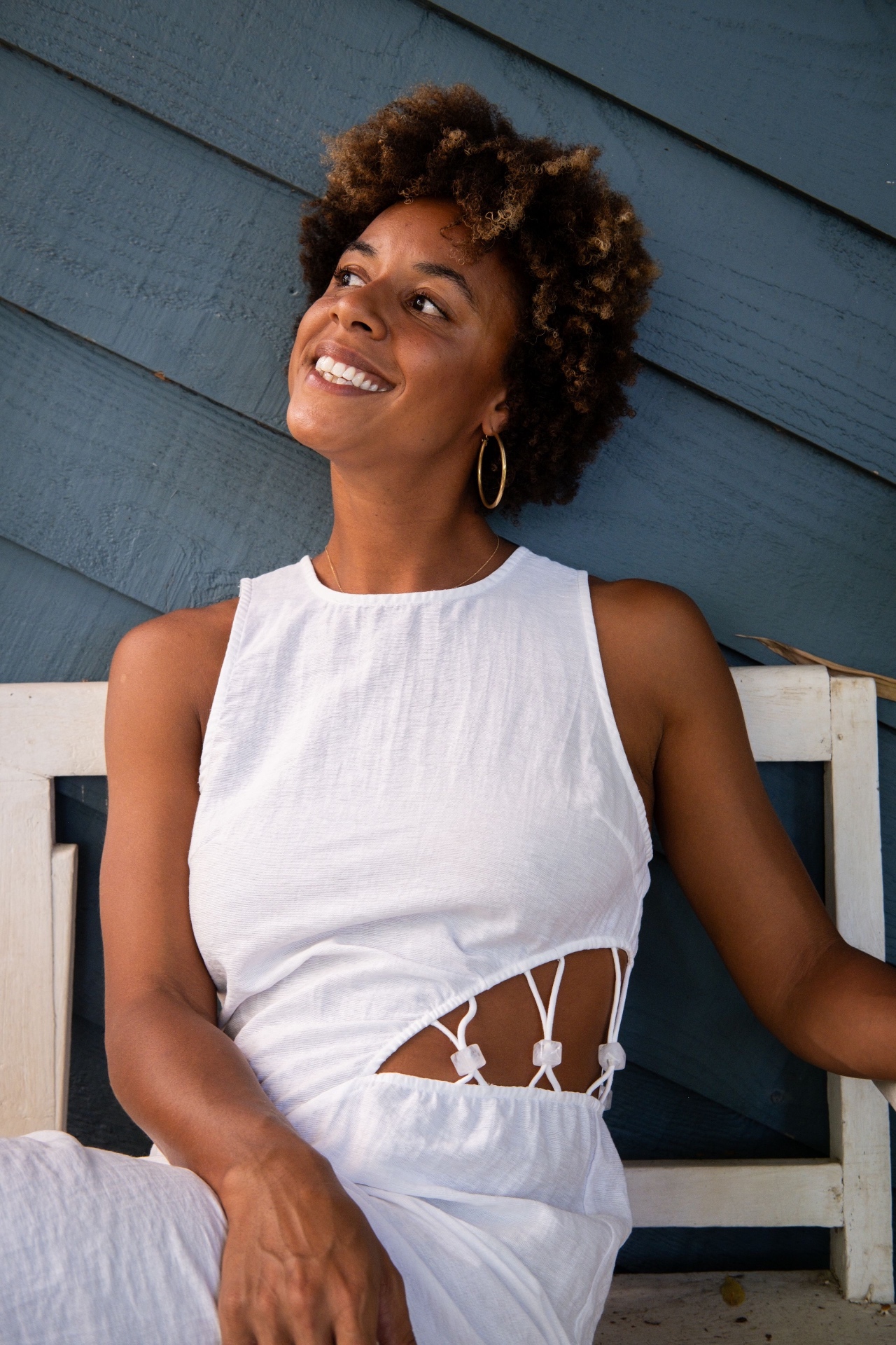 Chantelle seated calmly, looking upwards